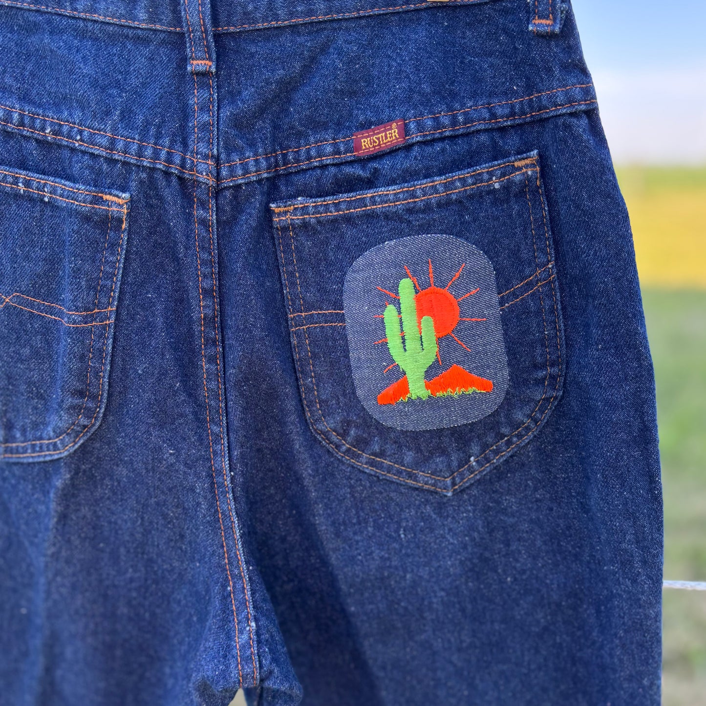 Vintage Western Women’s Rustler Jeans with Desert Patch