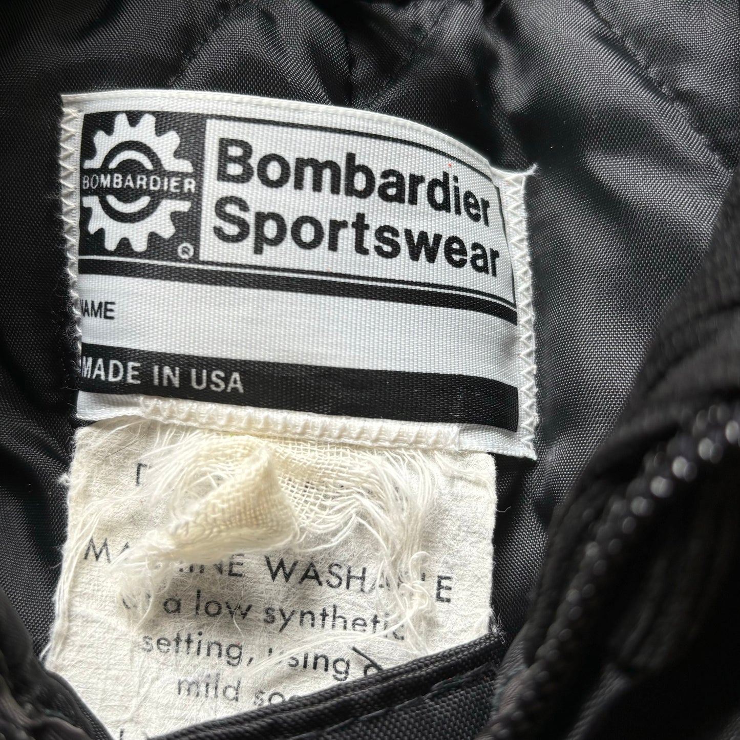 Vintage Bombardier Sportswear Black Ski/Snowmobile Jacket with Yellow and Orange Stripes| Made in USA