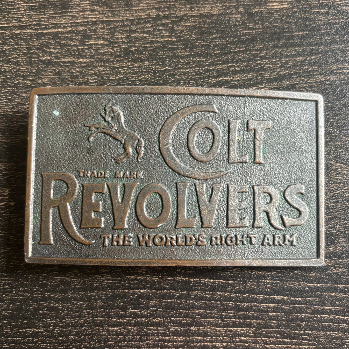 Vintage Colt Revolvers Brass Belt Buckle | “The World’s Right Arm” Western Cowboy Gun Collectible | 1970s Advertising