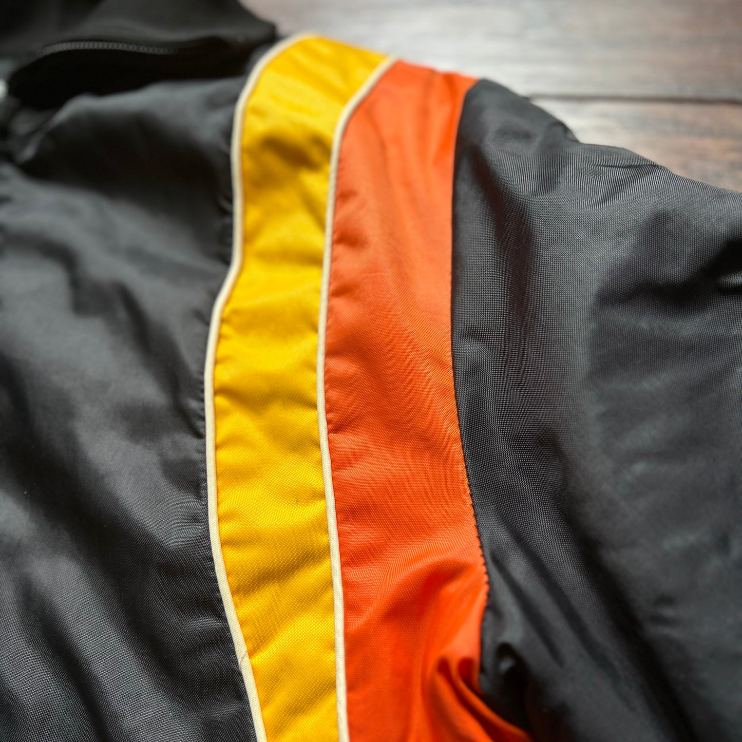 Vintage Bombardier Sportswear Black Ski/Snowmobile Jacket with Yellow and Orange Stripes| Made in USA